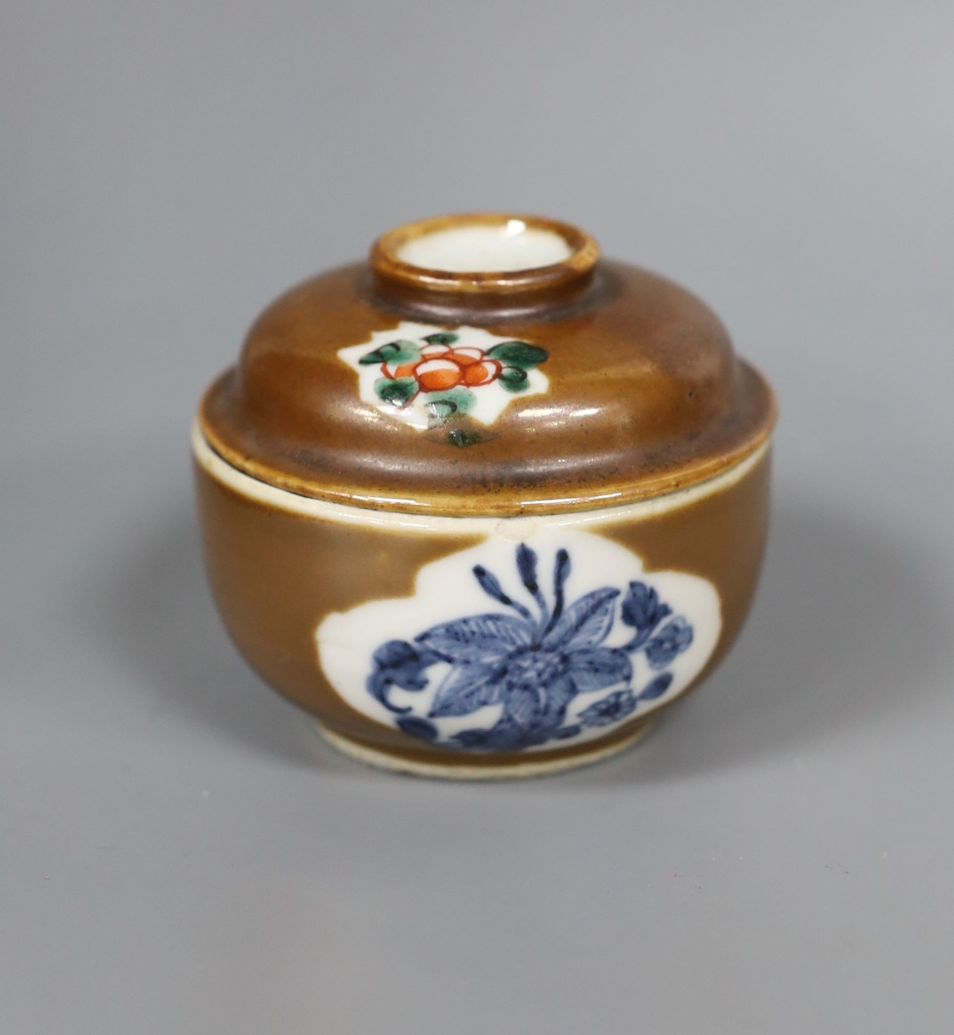 A Chinese cafe au lait glazed saucer, three bowls and a stem cup